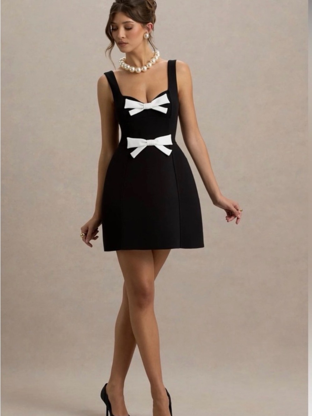 Club L London Black Mini Dress with White Bow Accents